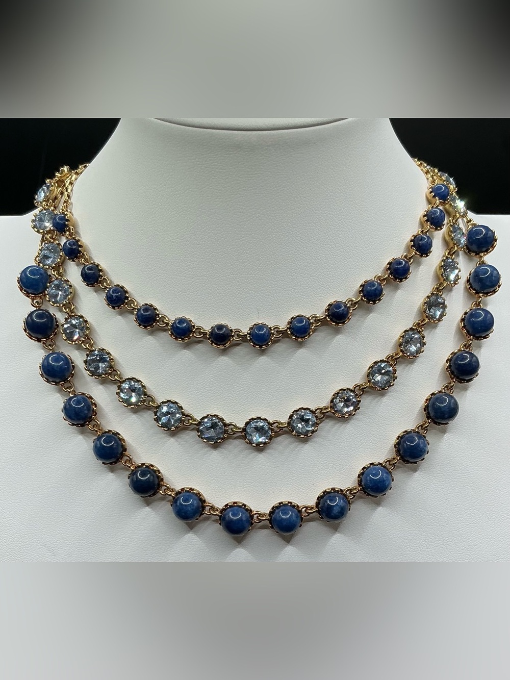 ANN KLEIN BLUE RHINESTONE AND STONE THREE LAYER GOLDTONE STATEMENT NECKLACE